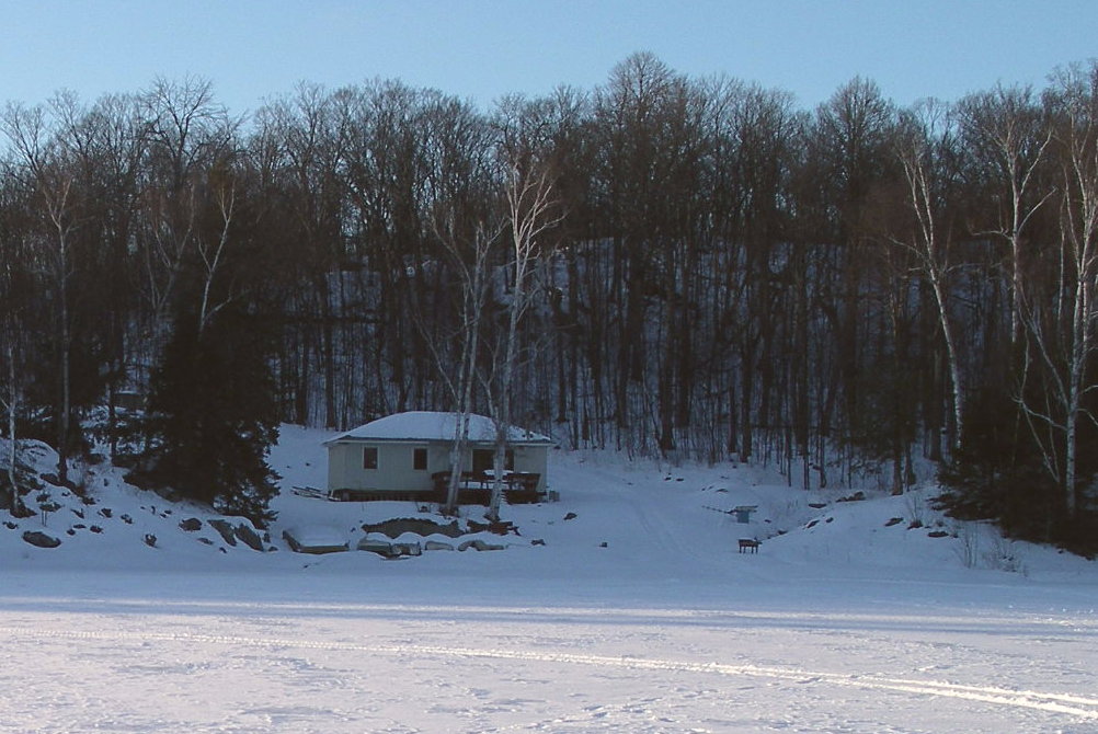 The club house on the frozen lake in winter
